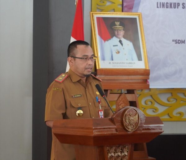 Asisten Administrasi Umum Sekretariat Daerah Prov. Kalteng Sri Suwanto saat membacakan sambutan. (Photo/ist)