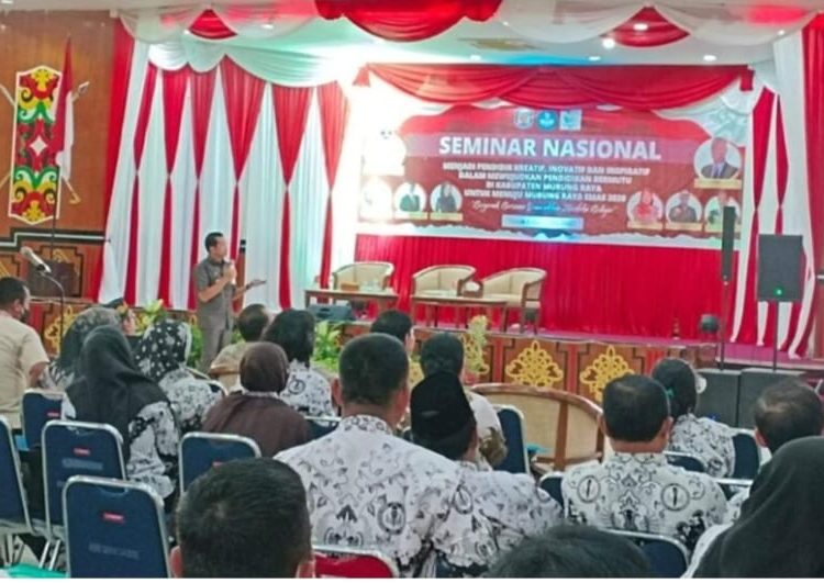 Bupati Murung Raya Perdie M. Yoseph menjadi narasumber dalam acara Seminar Nasional yang digelar oleh Dinas Pendidikan dan Kebudayaan di Gedung Pertemuan Umum (GPU) tira tangka balang pada Selasa (2/5). (ist)