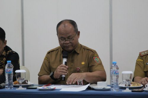 Plh Asisten Pemkesra Maskur saat membacakan sambutan.(Photo/duan)