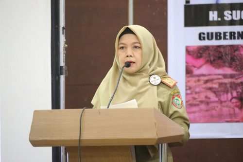 Asisten Ekbang Setda Prov Kalteng Sri Widanarni saat membacakan sambutan.(Photo/feri)